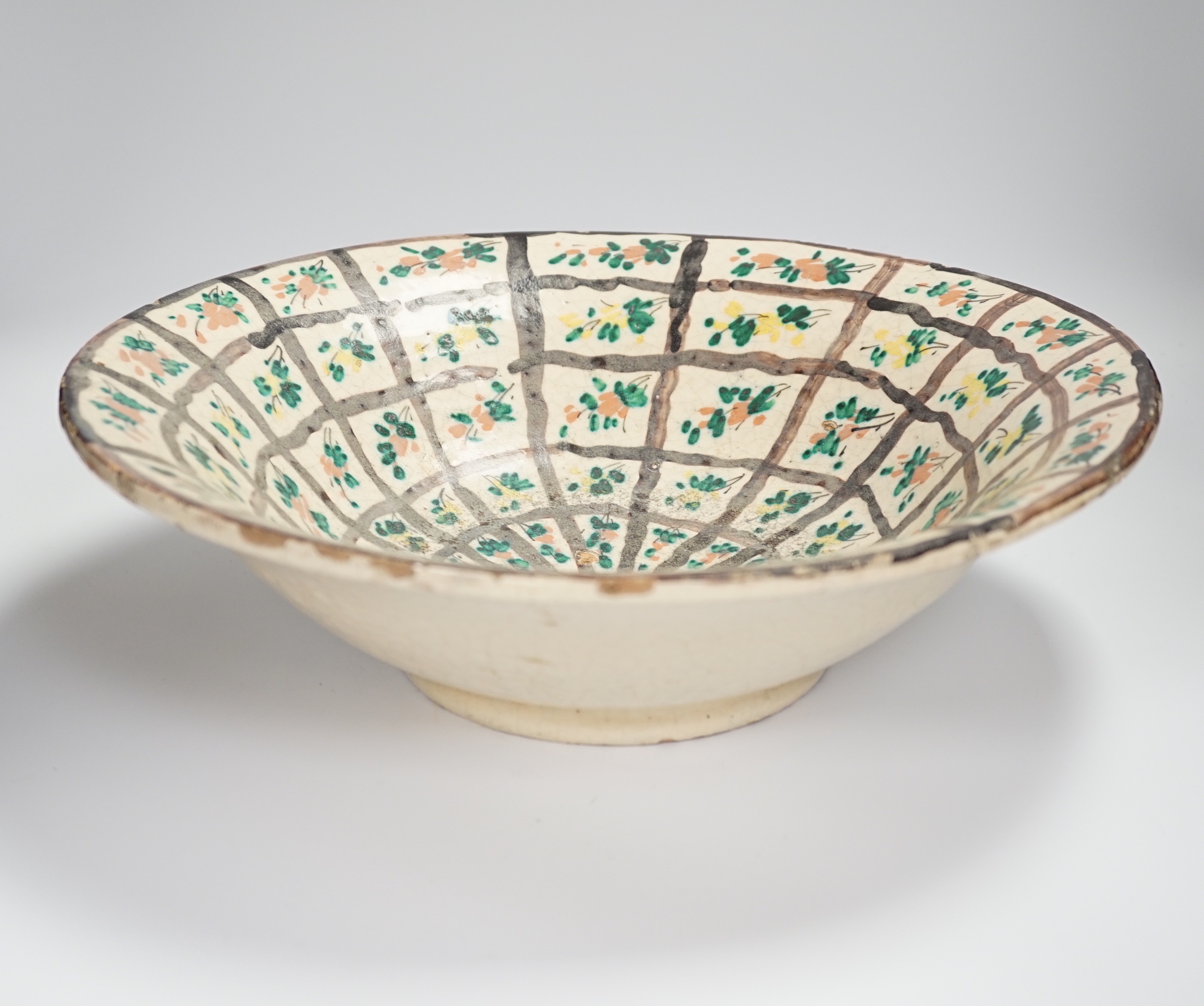 A large Persian glazed pottery bowl, 39cm diameter